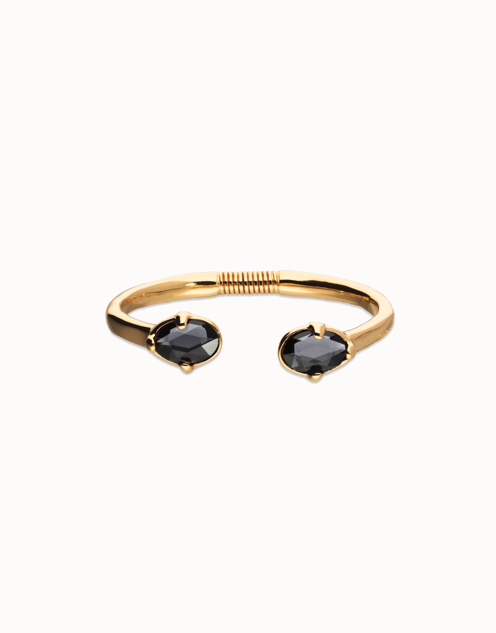 UNO DE 5O- Bangle bracelet with two faceted black oval crystals image 0