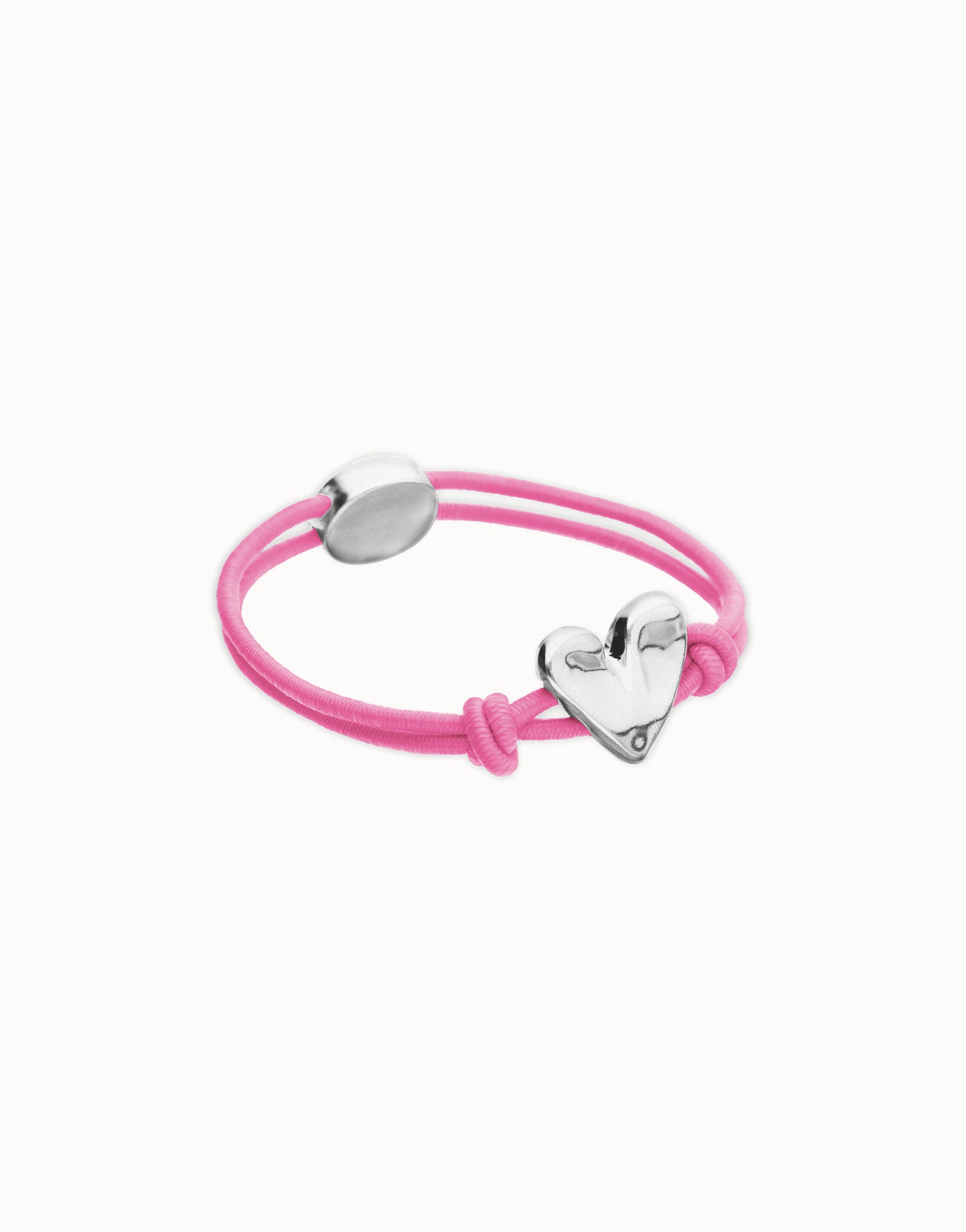 UNO DE 50 “Pálpito Collection”- Pink elastic thread bracelet with heart charm