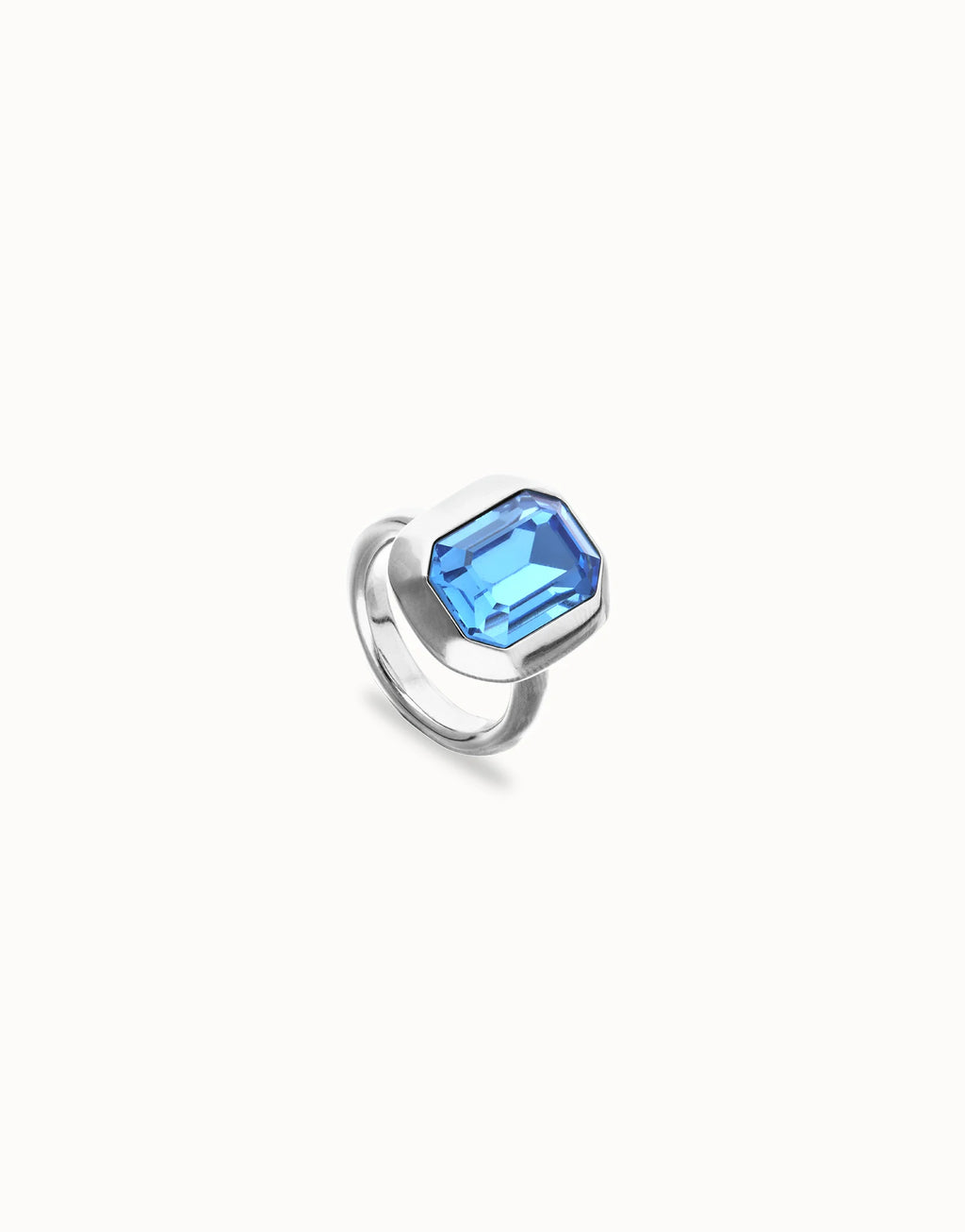 UNO DE 50- “Núcleo Collection” Rectangular ring with blue faceted crystal