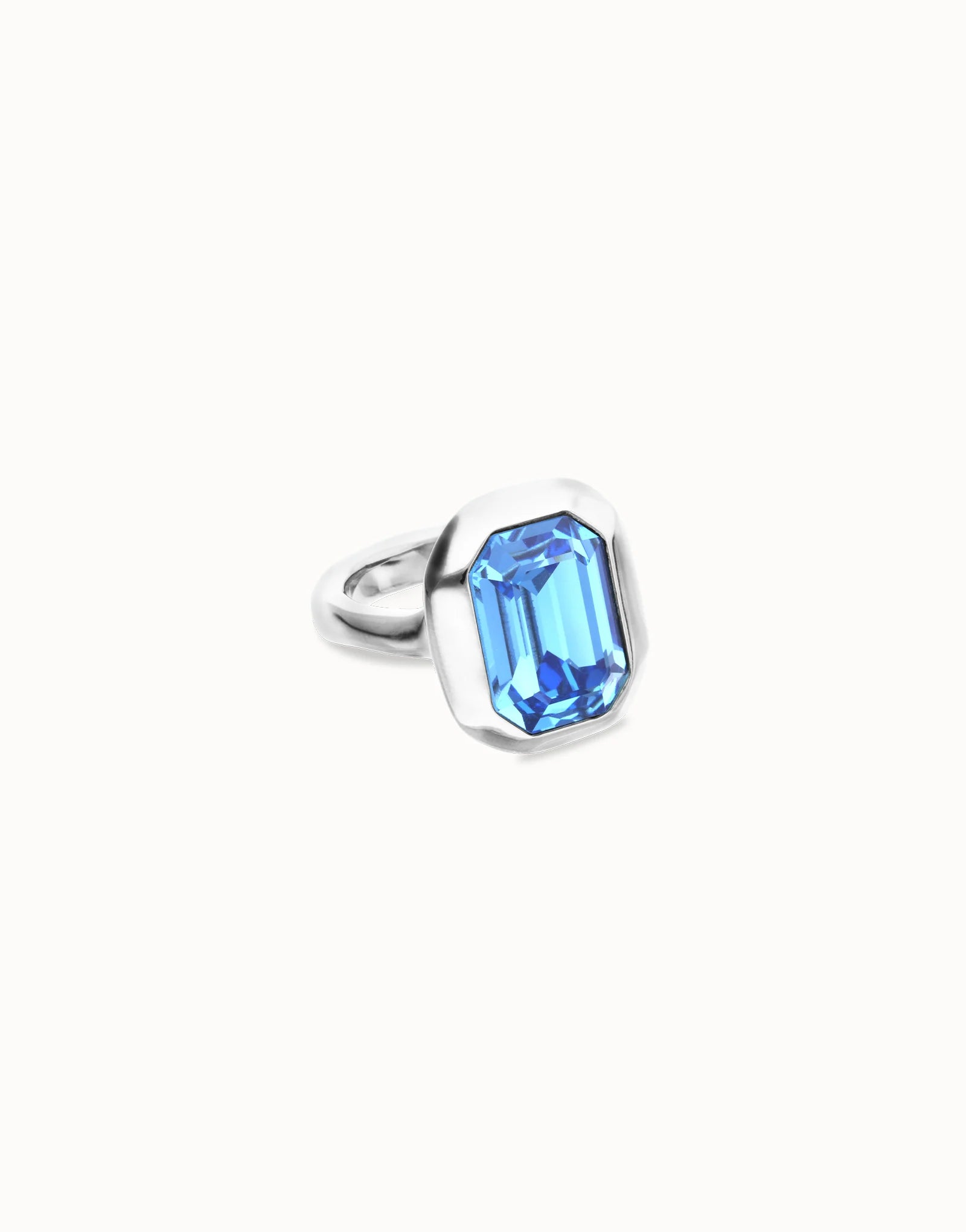 UNO DE 50- “Núcleo Collection” Rectangular ring with blue faceted crystal