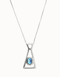 UNO DE 50- “Núcleo Collection” Long necklace with pendant and rectangular blue faceted crystal
